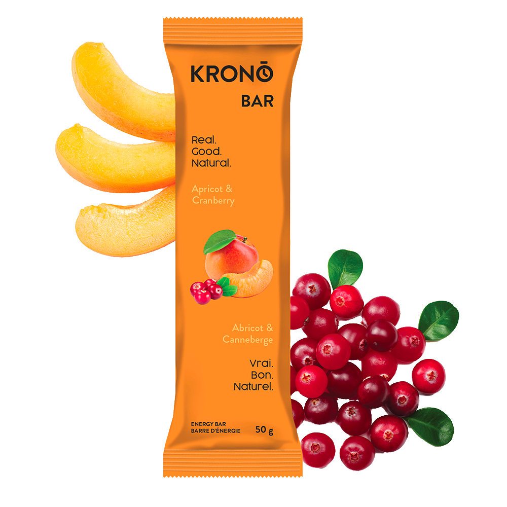 Krono Nutrition apricot and cranberry energy bar, apricots and cranberries in the background