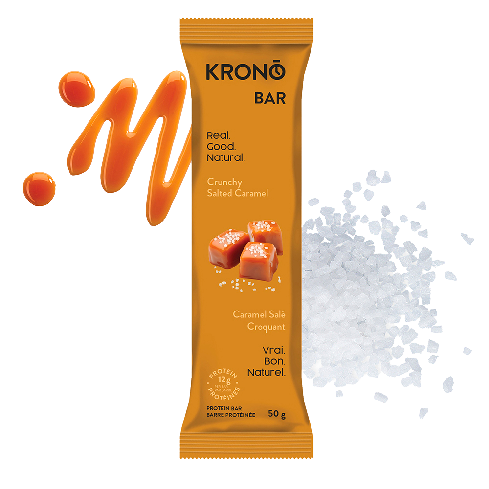Krono Nutrition crunchy salted caramel protein bar, caramel and salt in the background