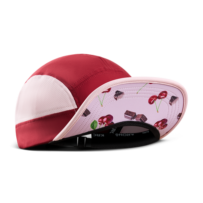 Krono Nutrition cherry chocolate cap, front view, brim up