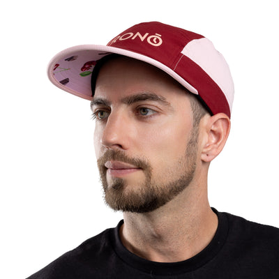 Man wearing Krono Nutrition cherry chocolate cap