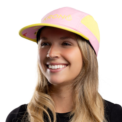 Woman wearing Krono Nutrition pink lemonade cap