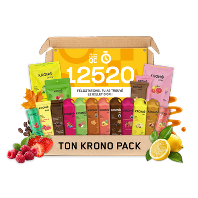 A KRONO coffee gift set box labeled 'TON KRONO PACK' filled with assorted KRONO branded pouches and packets, with fruit and coffee-themed decorative elements around it on a white background.