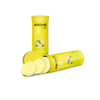 Krono Nutrition lemon and lime effervescent tablets, open with a few tablets coming out of the tube