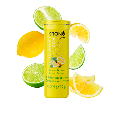 Krono Nutrition lemon and lime effervescent tablets, lemons and limes in the background