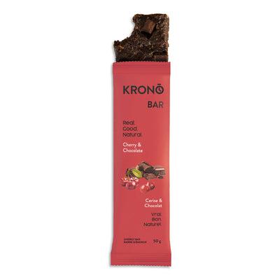 Krono Nutrition cherry and chocolate energy bar, with a bite taken out of it
