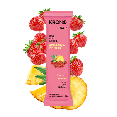 Krono Nutrition strawberry and pineapple energy bar, strawberries and pineapples in the background