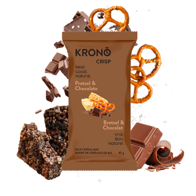 Krono Nutrition pretzel and chocolate energy rice cakes, pretzels and chocolate in the background
